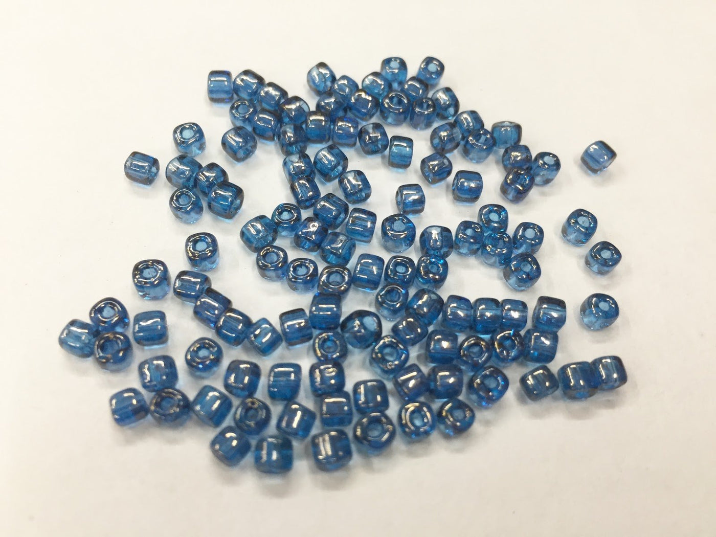 premium-ink-blue-transparent-lustre-round-rocaille-glass-beads-6-0