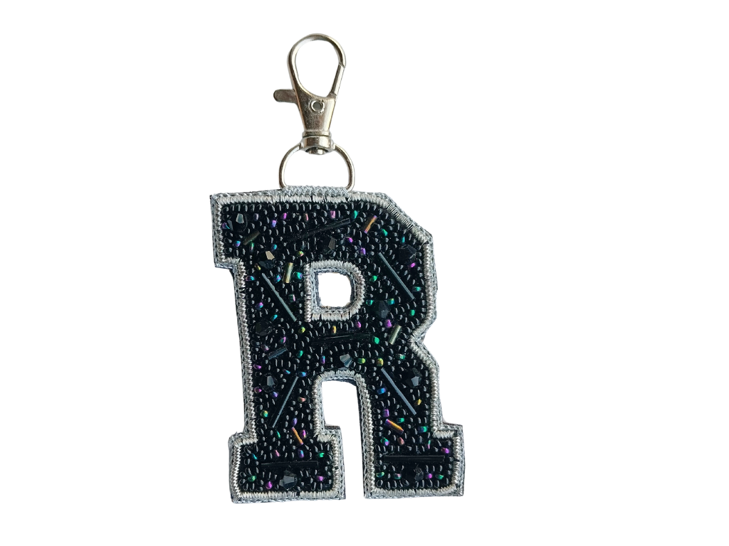 Black Cutdana 'R' Alphabet Bag Charm