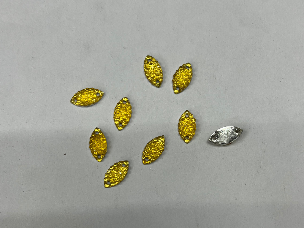 Bright Golden Eye Flat Back 2 Hole Plastic Stones