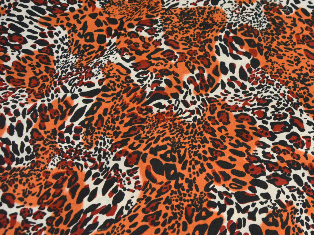 Orange Leopard Digitally Printed Butter Crepe Fabric
