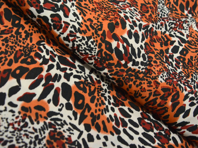 Orange Leopard Digitally Printed Butter Crepe Fabric
