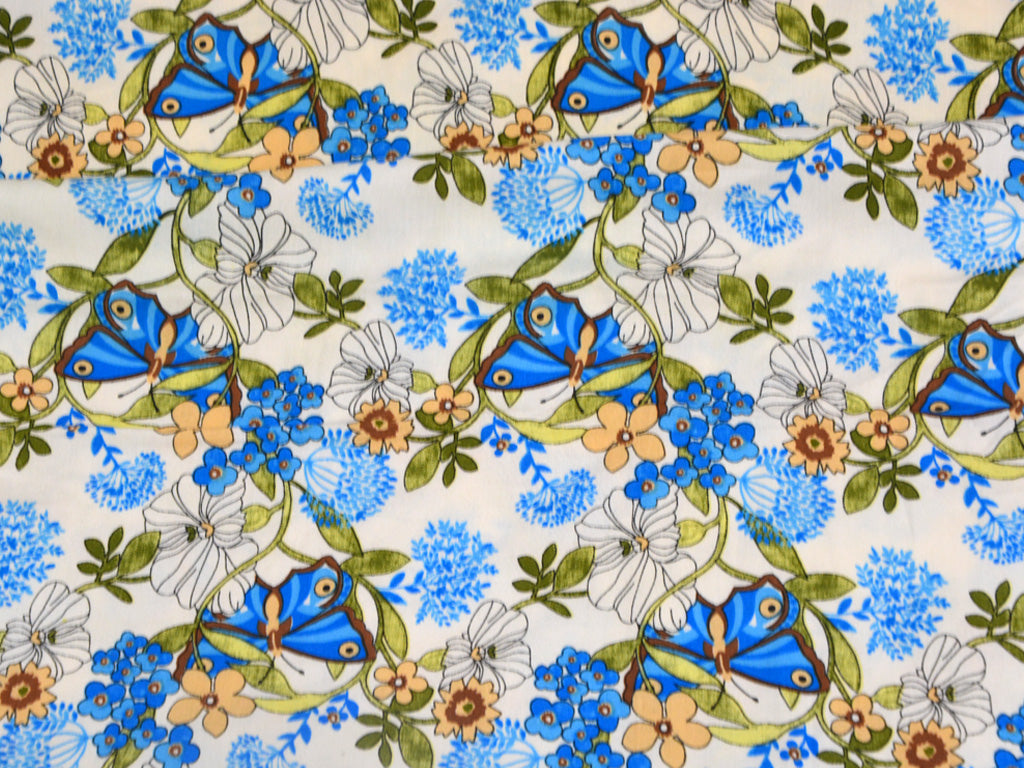 White & Blue Quirky Printed Rayon Fabric
