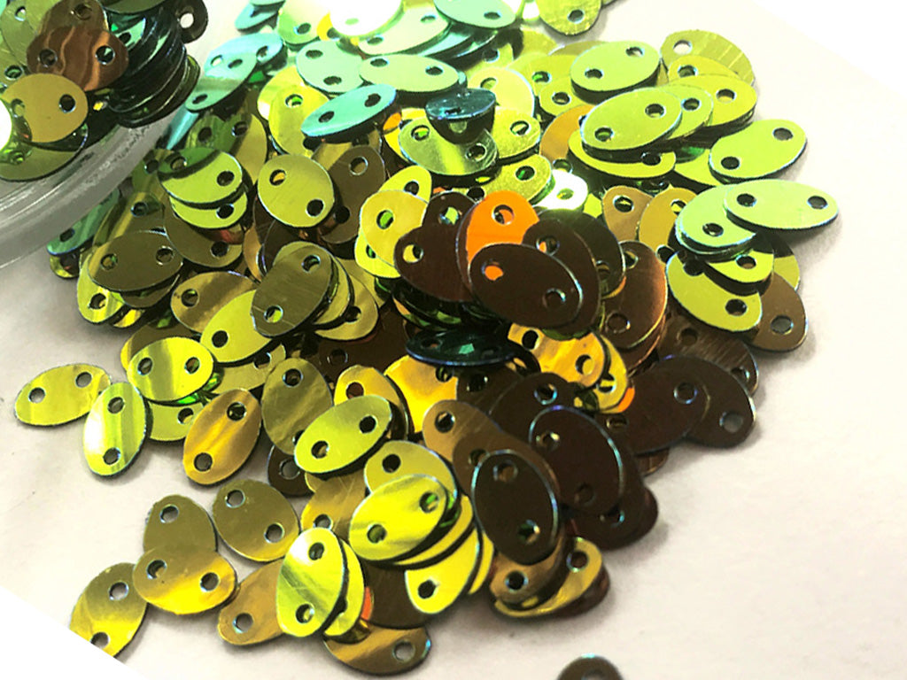 green-golden-dual-colour-2-hole-oval-plastic-sequins (1581782237218)