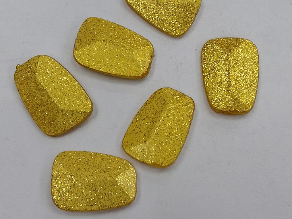 Golden Asymmetric Plastic Stones