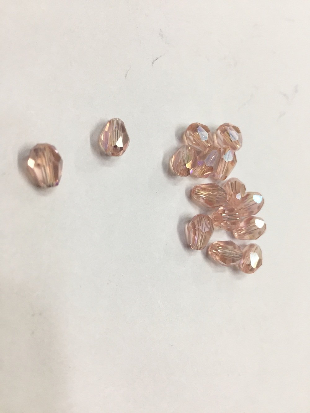 light-pink-transparent-lustre-drop-shaped-crystal-glass-beads