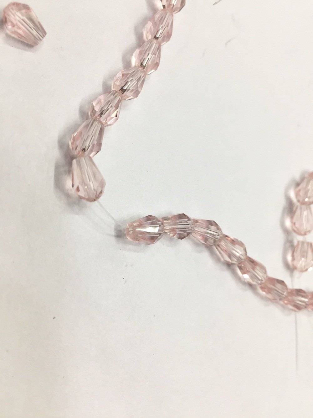 light-pink-transparent-drop-shaped-crystal-glass-beads