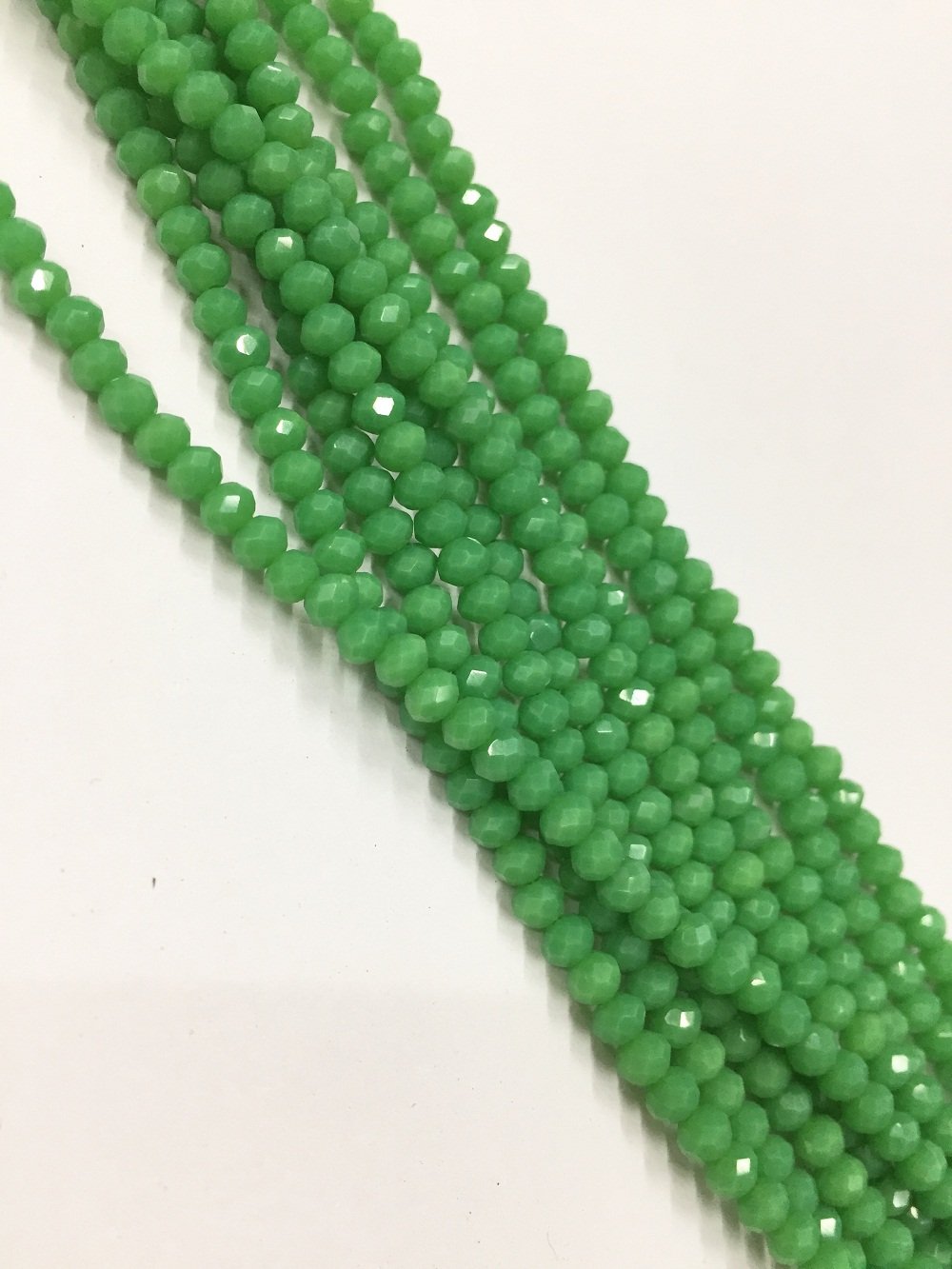 dark-green-opaque-tyre-crystal-glass-beads-1