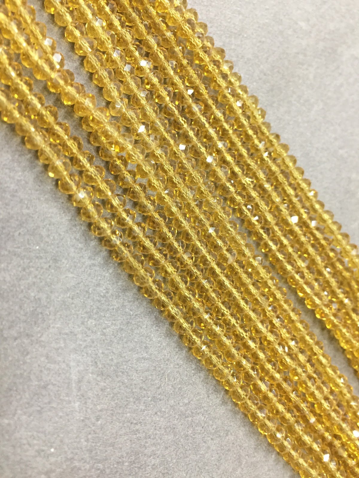 golden-transparent-tyre-crystal-glass-beads-1