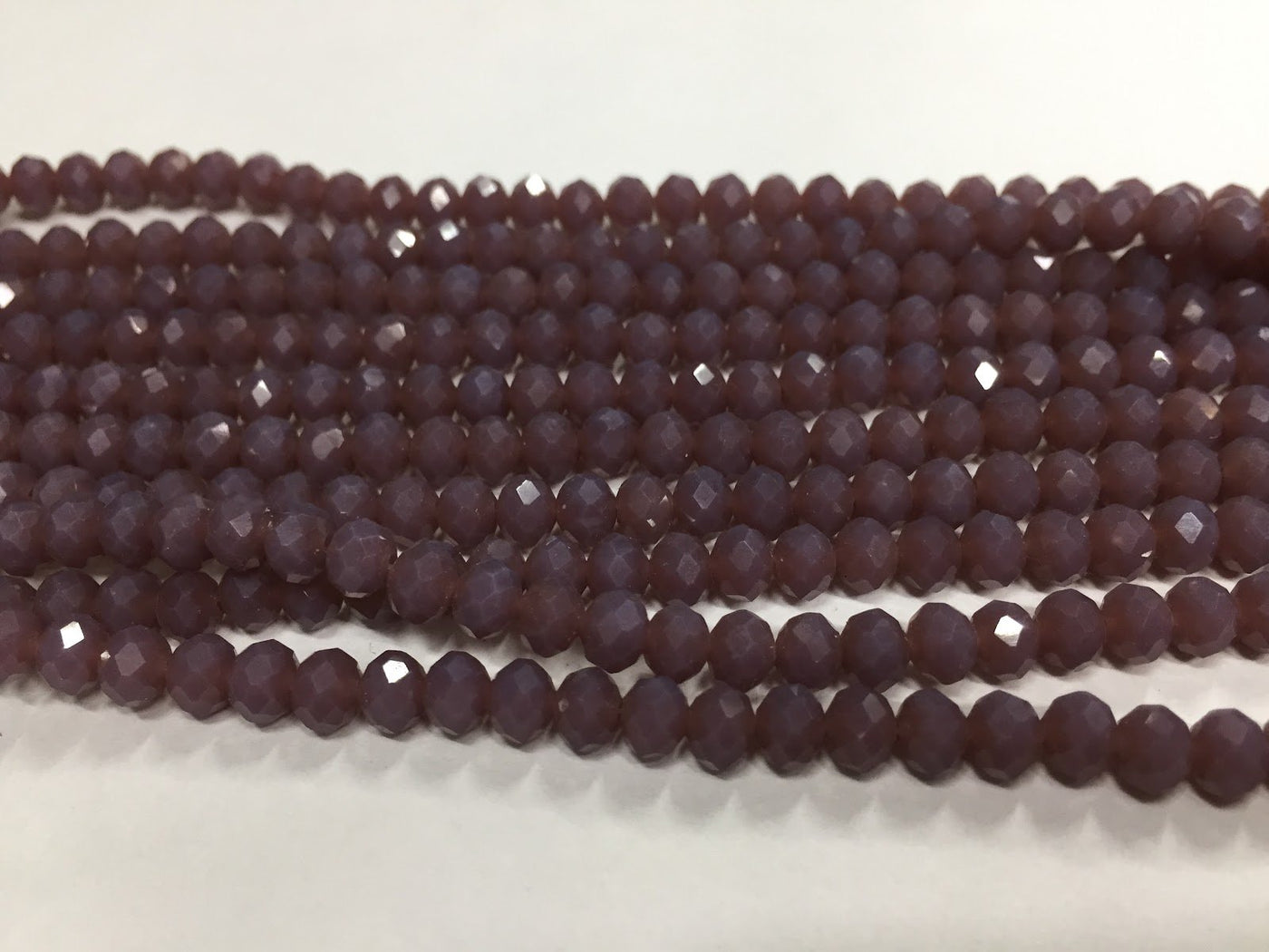 mauve-opaque-tyre-crystal-glass-beads