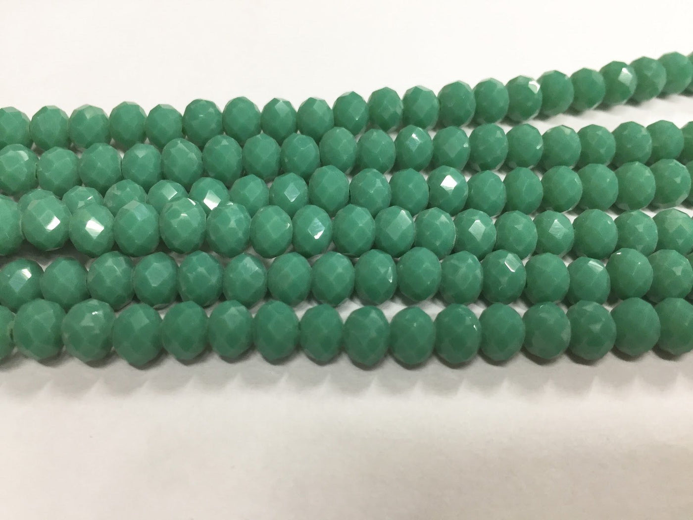 green-opaque-tyre-crystal-glass-beads-2