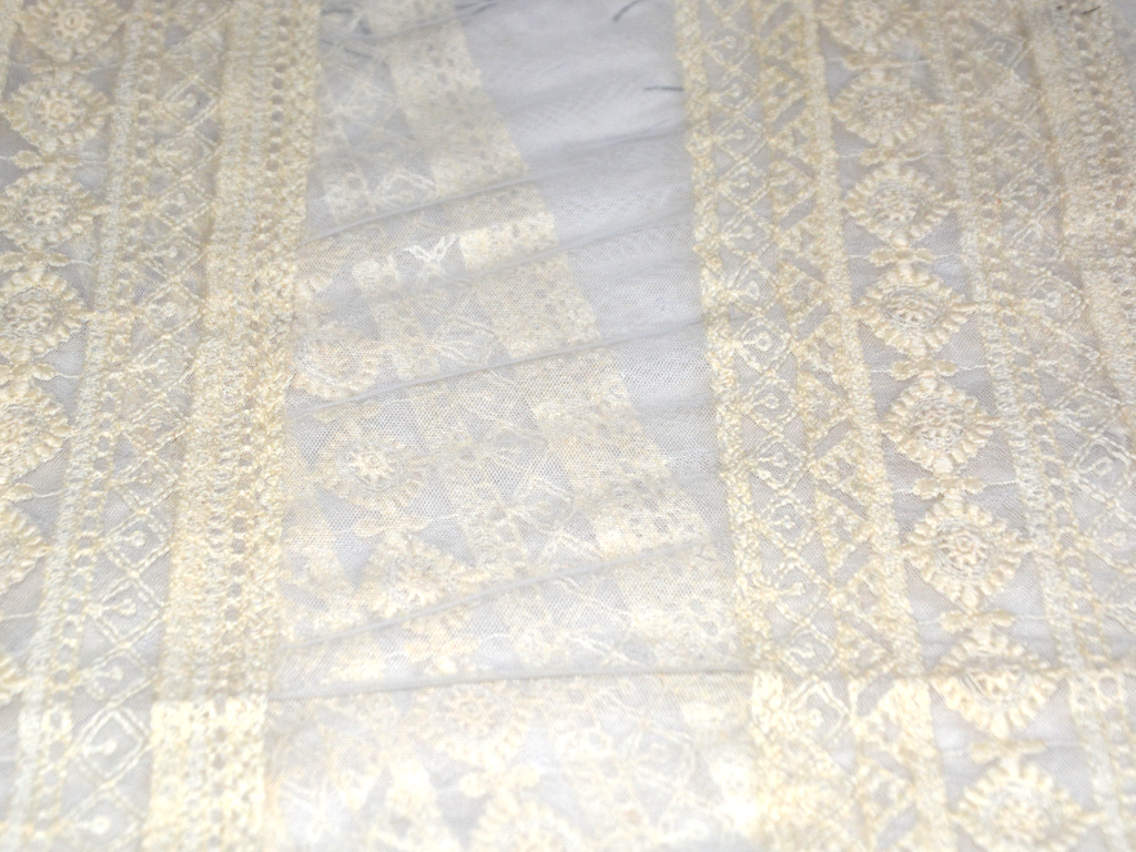 cream-floral-cotton-thread-embroidered-net-fabric