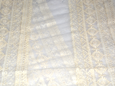 cream-floral-cotton-thread-embroidered-net-fabric