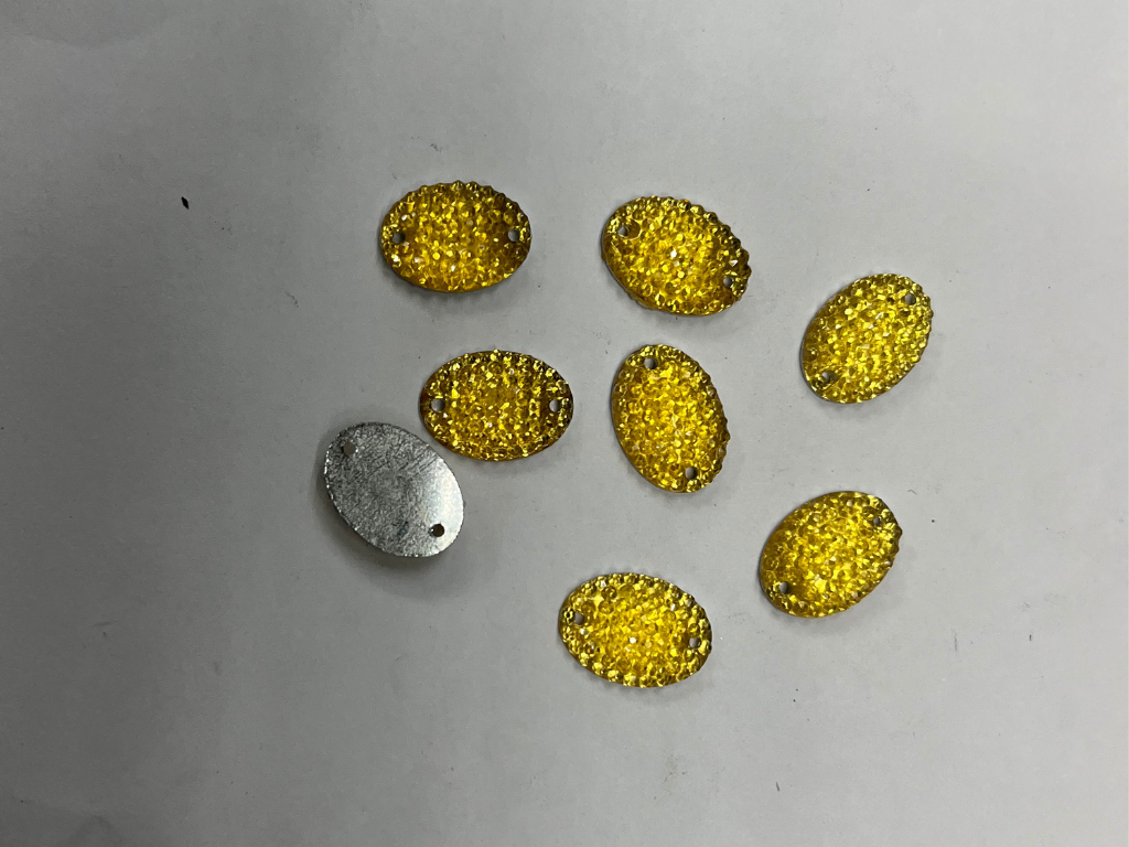 Golden Oval 2 Hole Flat Back Plastic Stones