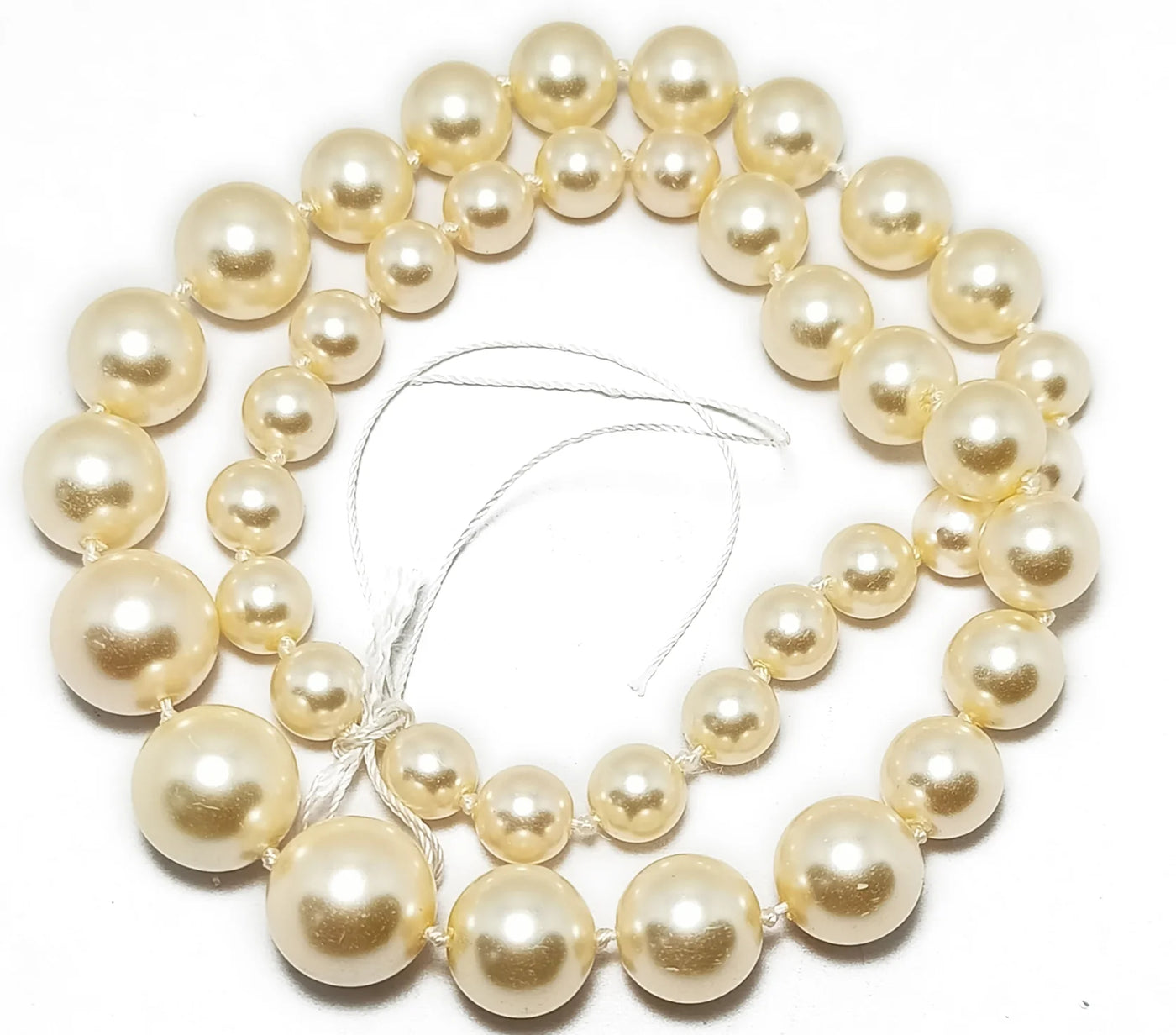 Light Golden Spherical Glass Pearl Gradation Beads