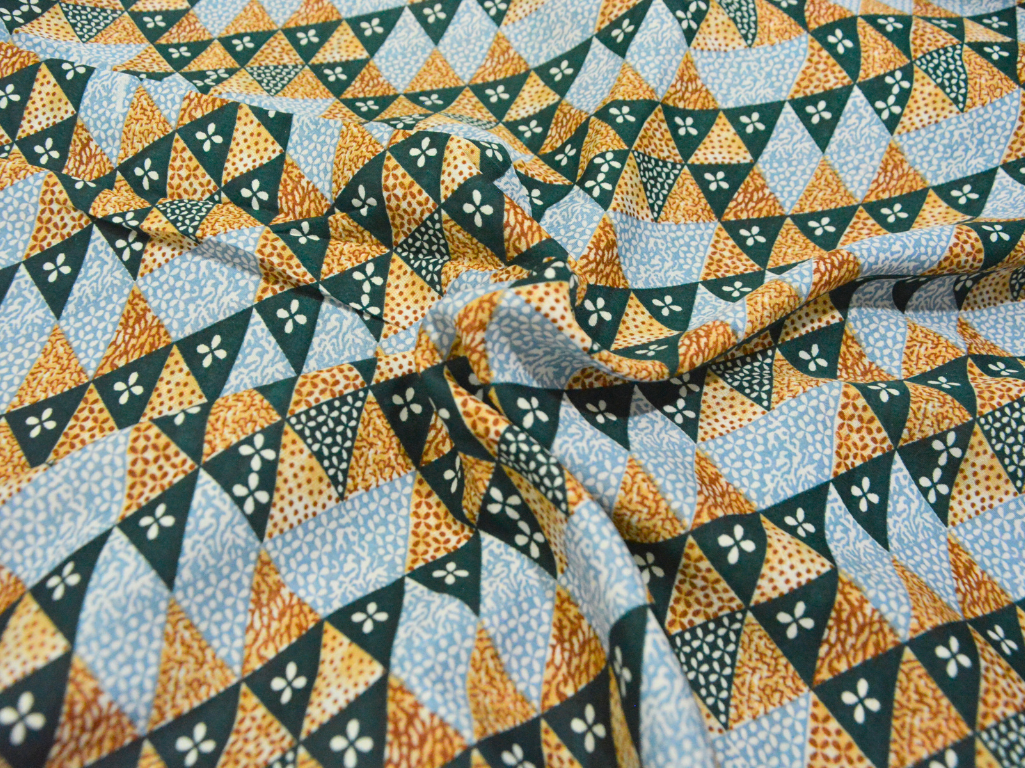 Dark Green Tringular Digitally Printed Butter Crepe Fabric