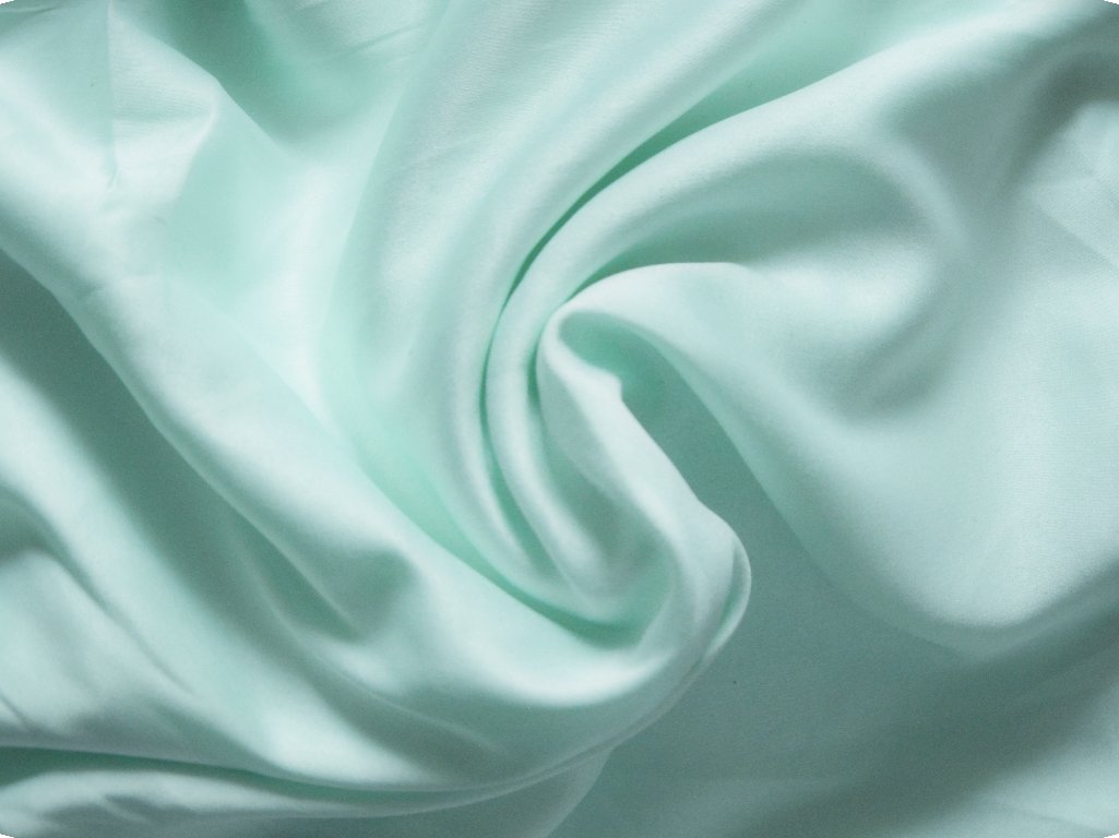 Pastel Soft Green Plain Malai Satin Fabric (Wholesale)