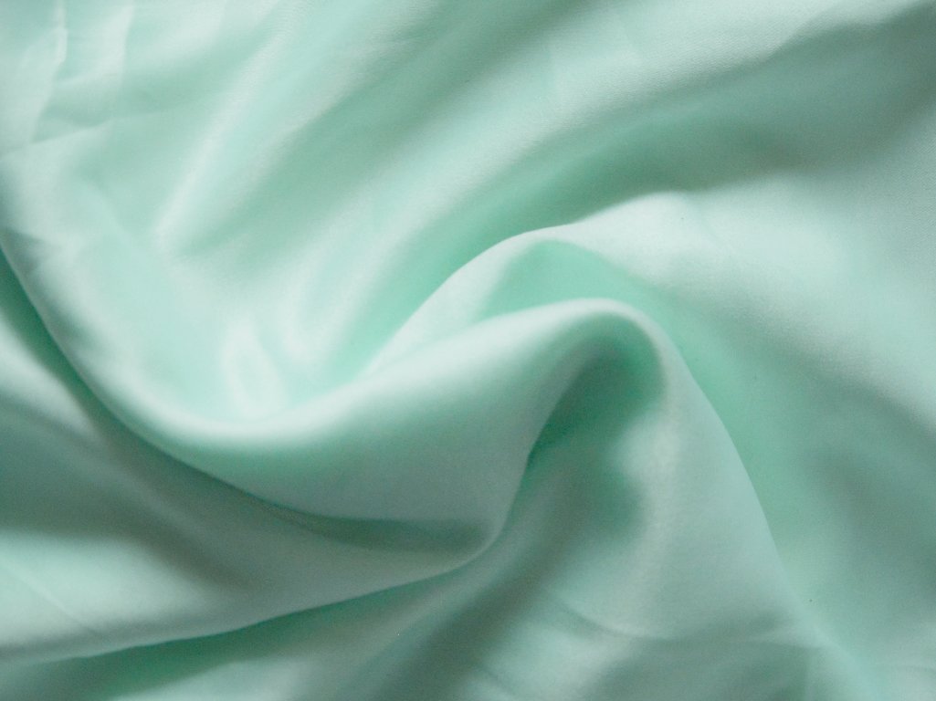 Pastel Soft Green Plain Malai Satin Fabric (Wholesale)