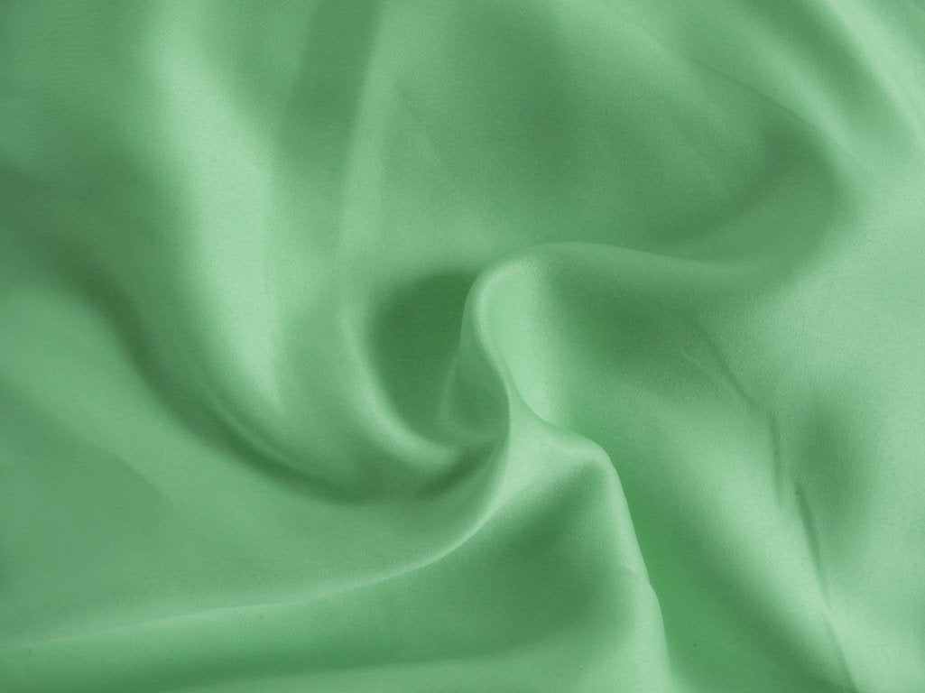 Pastel Leaf Green Plain Malai Satin Fabric (Wholesale)