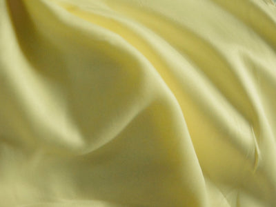 Pastel Lemon Yellow Plain Malai Satin Fabric (Wholesale)