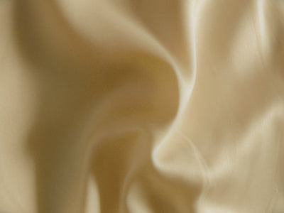 Pastel Light Cream Plain Malai Satin Fabric (Wholesale)