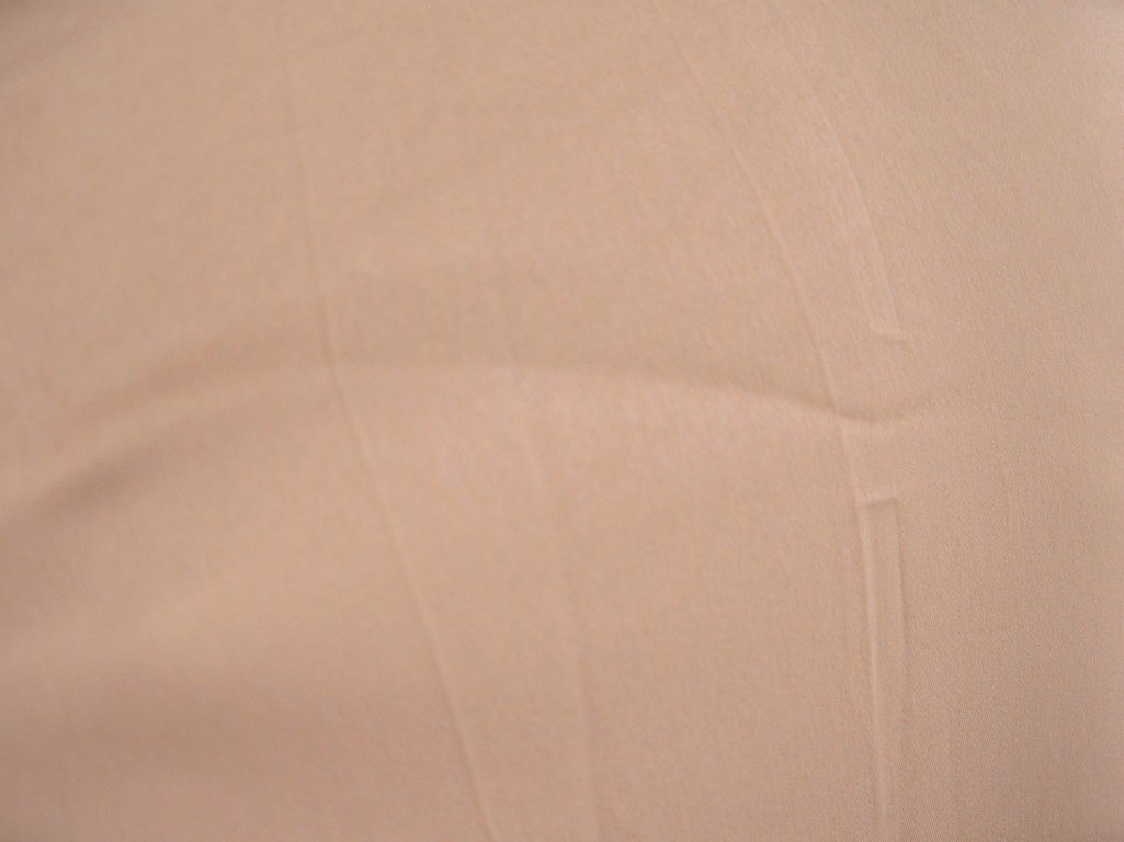 Pastel Peach Plain Malai Satin Fabric (Wholesale)
