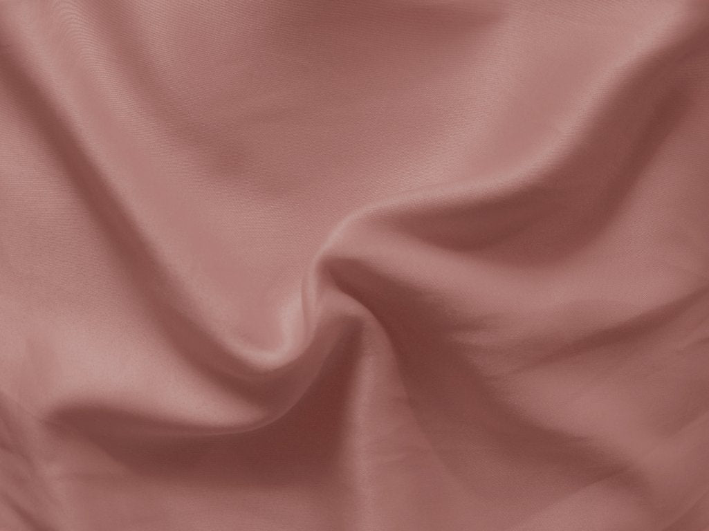 Pastel Dark Peach Plain Malai Satin Fabric (Wholesale)