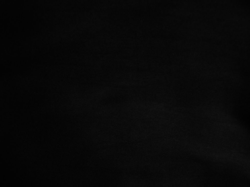 Glossy Black Plain Malai Satin Fabric