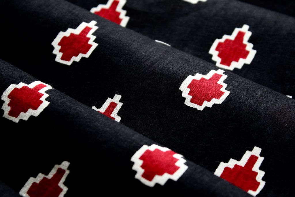 Black And Red Motifs Printed Pure Cotton Fabric