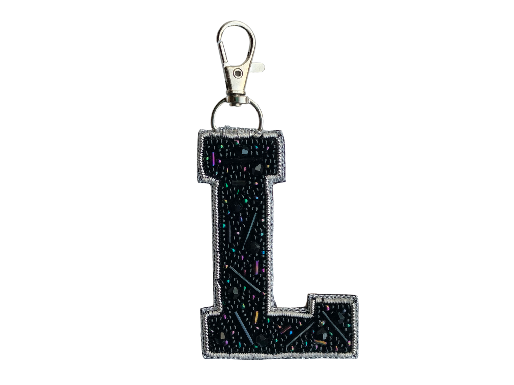 Black Cutdana 'L' Alphabet Bag Charm