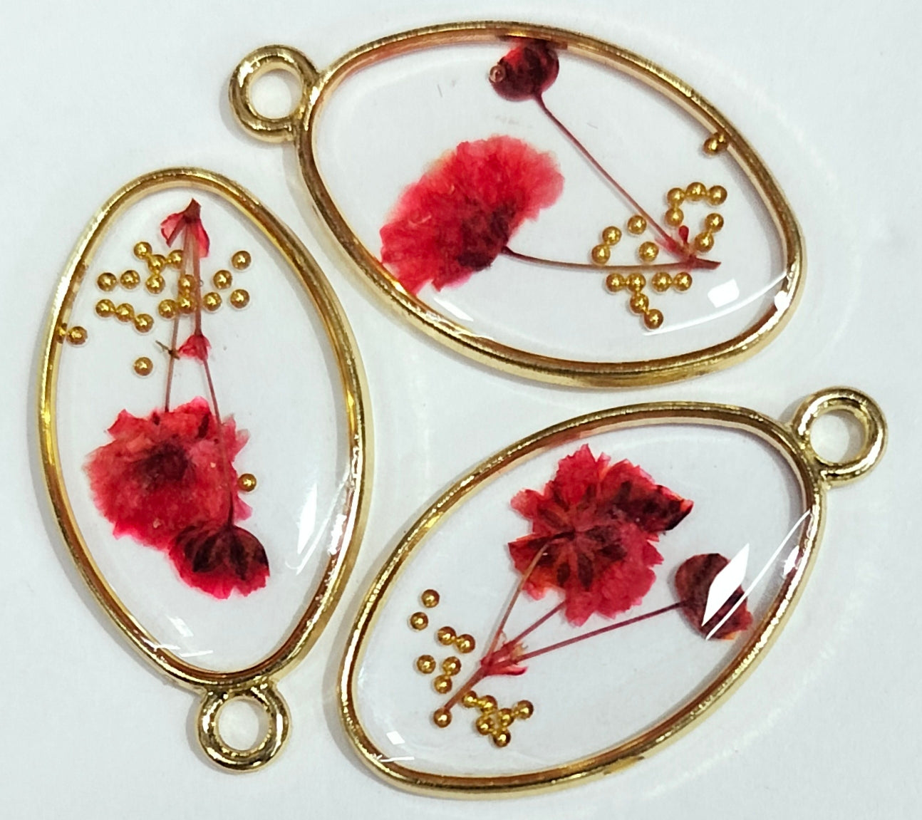 Red & Golden Oval Shaped Floral Design Resin Pendants with One Hole