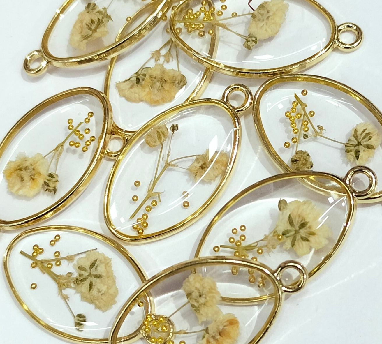 Yellow & Golden Oval Shaped Floral Design Resin Pendants with One Hole