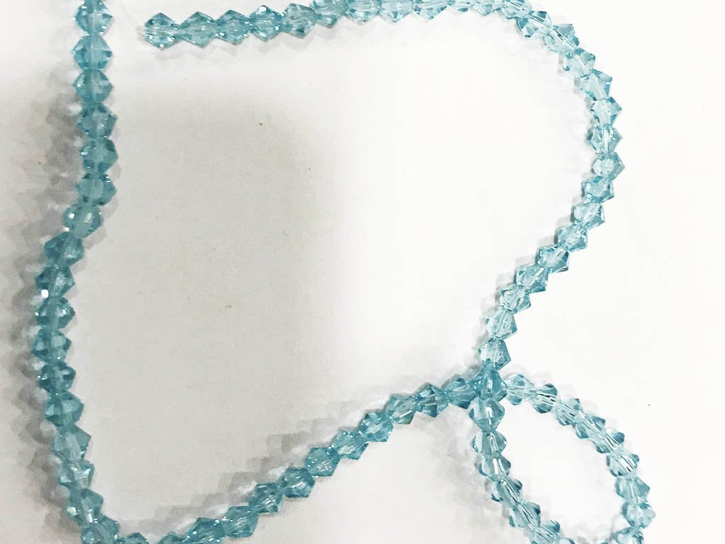 light-blue-transparent-new-cut-cross-cut-pressed-glass-beads-4-mm
