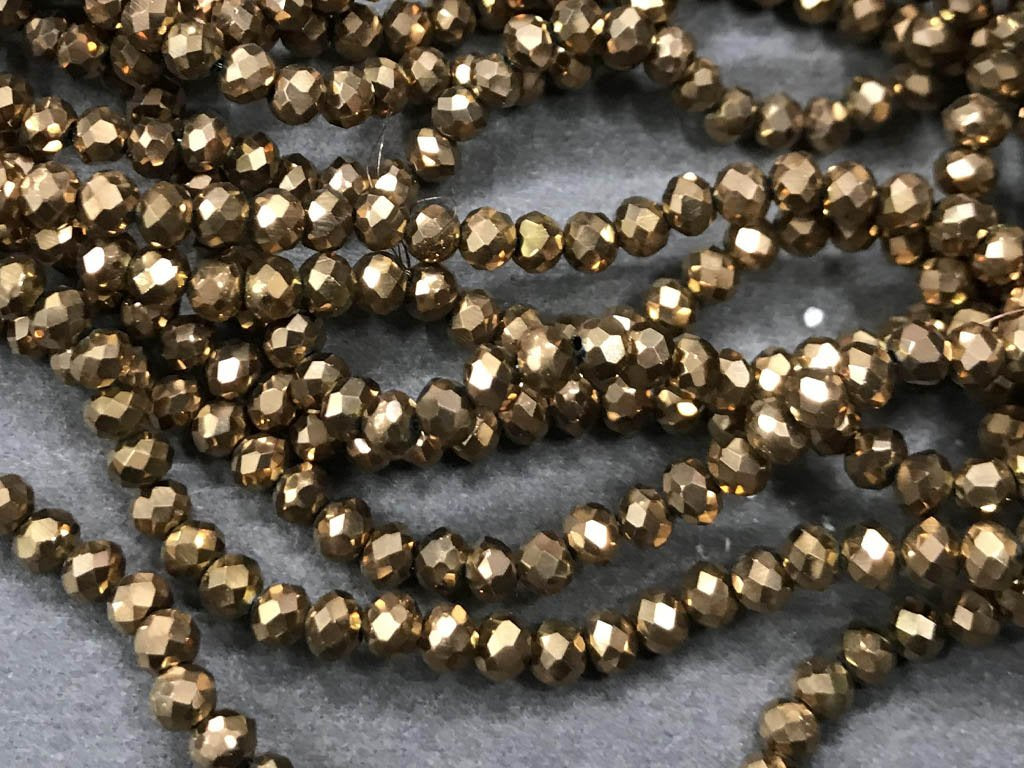 golden-metallic-tyre-glass-crystal-beads