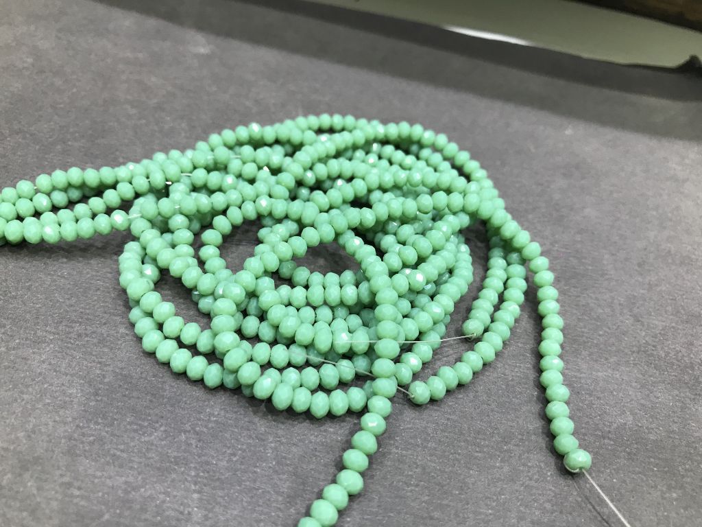 light-green-opaque-tyre-glass-beads