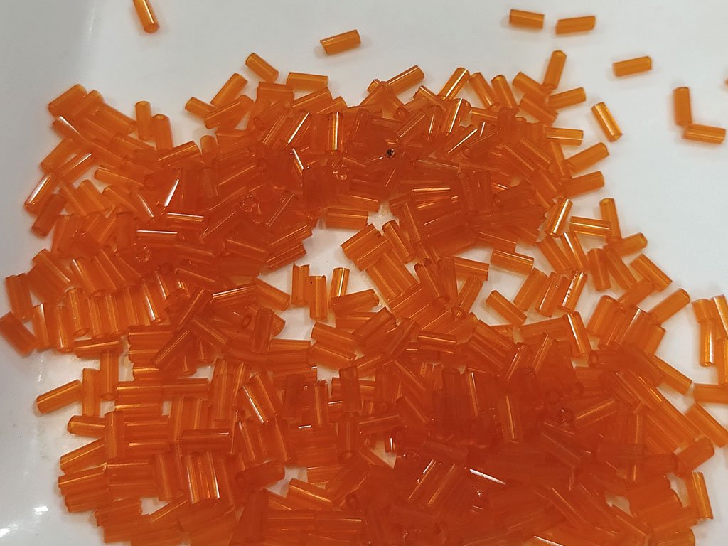 orange-transparent-bugle-pipe-beads