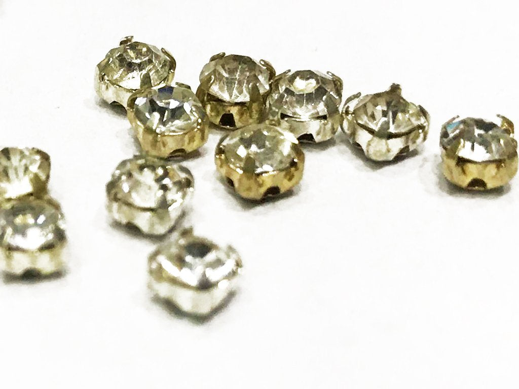 सिल्वर कैचर के साथ सफ़ेद पारदर्शी गोलाकार ग्लास स्टोन (16 SS) (थोक)