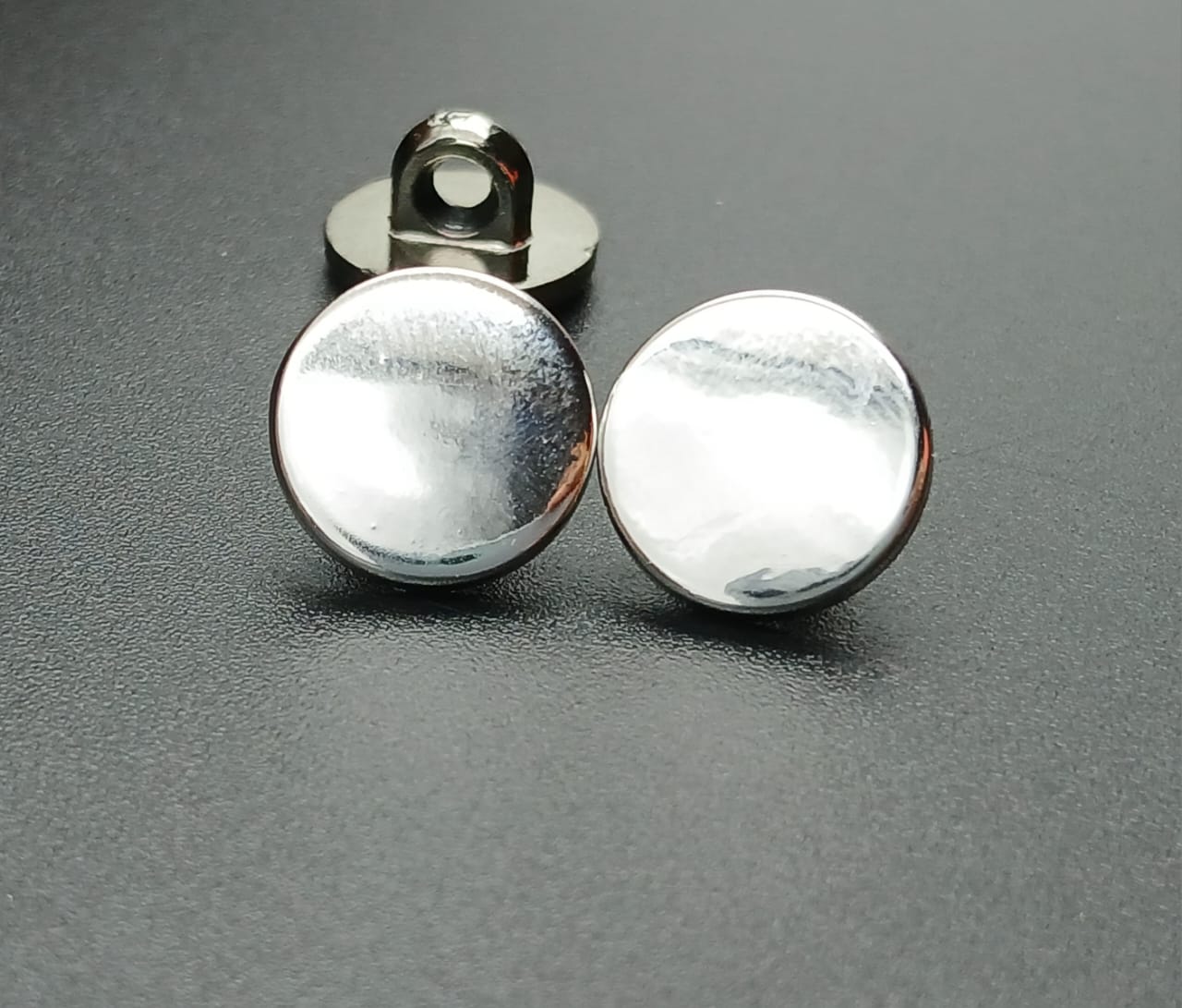 Silver Circular 18L Down Hole Polyester Buttons