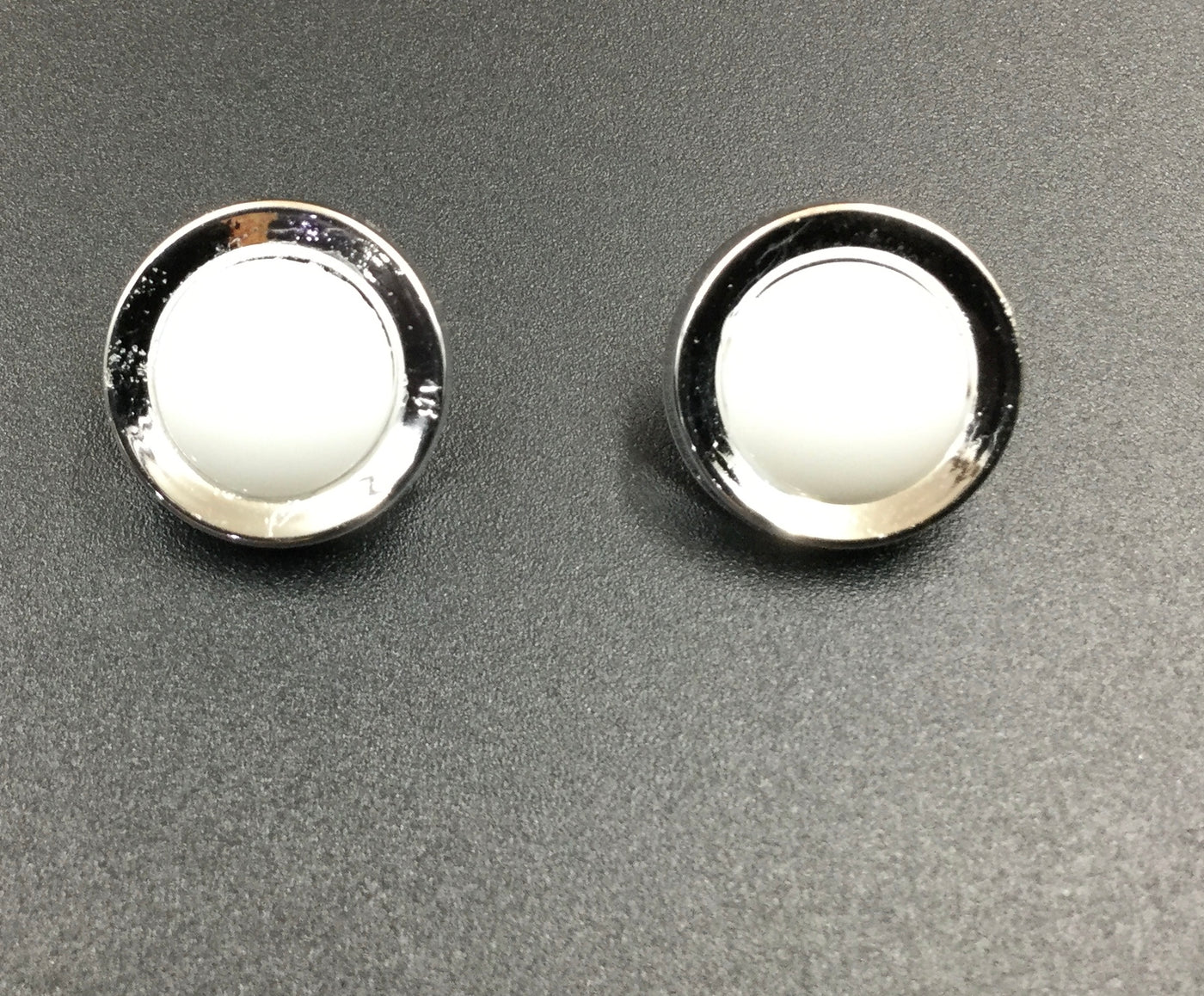 White & Silver Circular Plastic Buttons