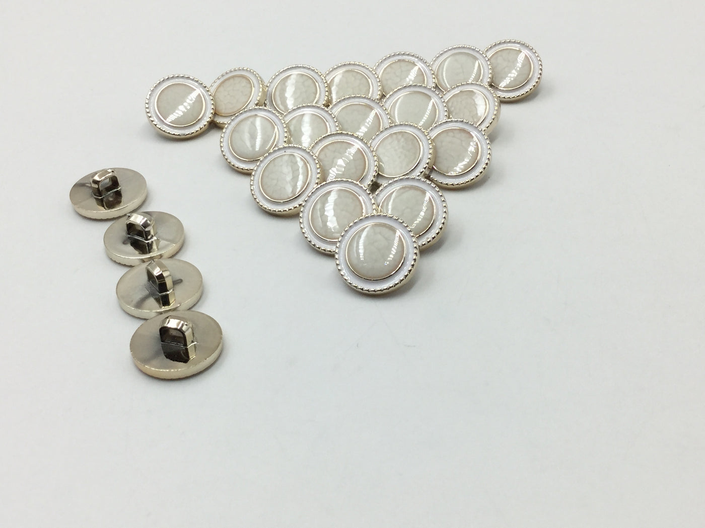 White & Golden Circular Plastic Button