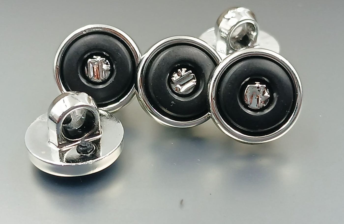 Black & Silver Circular Down Hole Polyester Buttons 18L