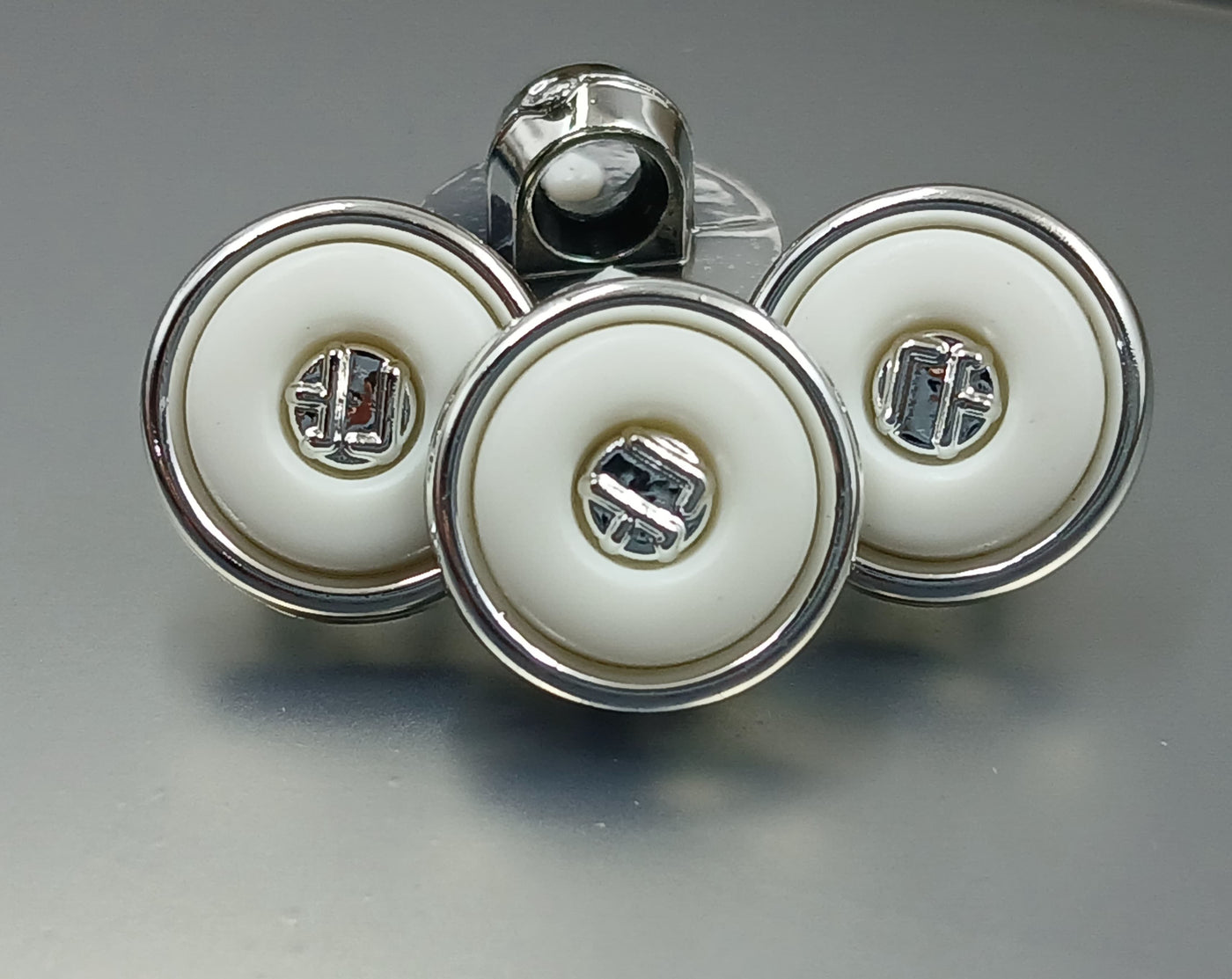 White & Silver Circular 18L Down Hole Polyester Buttons