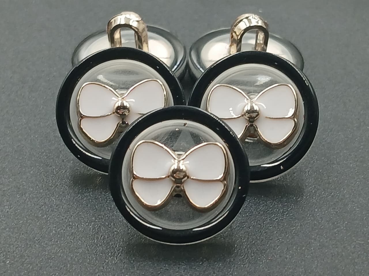 White and Black Circular 24L Down Hole Polyester Buttons