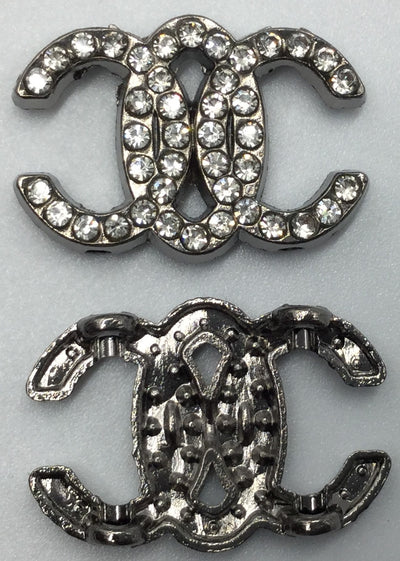 Silver Chanel Shaped Badges