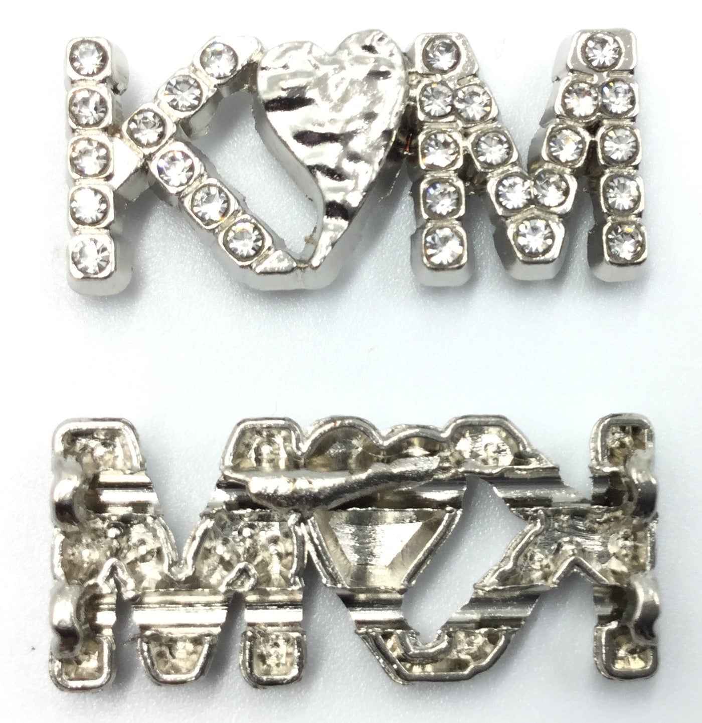 Silver KM Shaped Badge