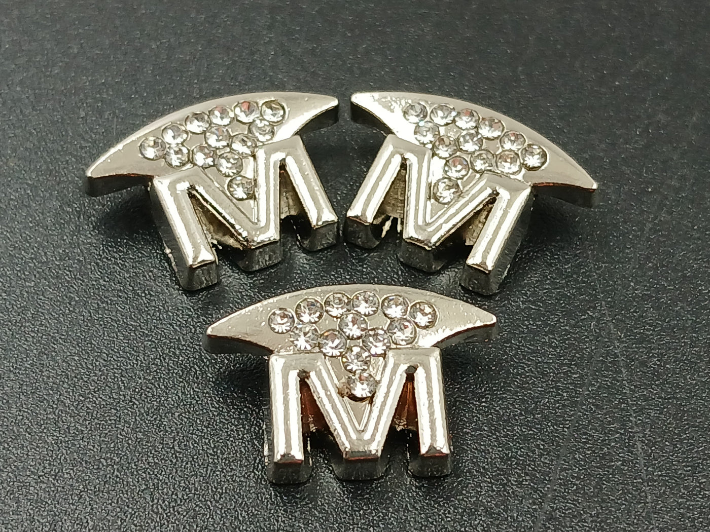 Silver M Shape Badges