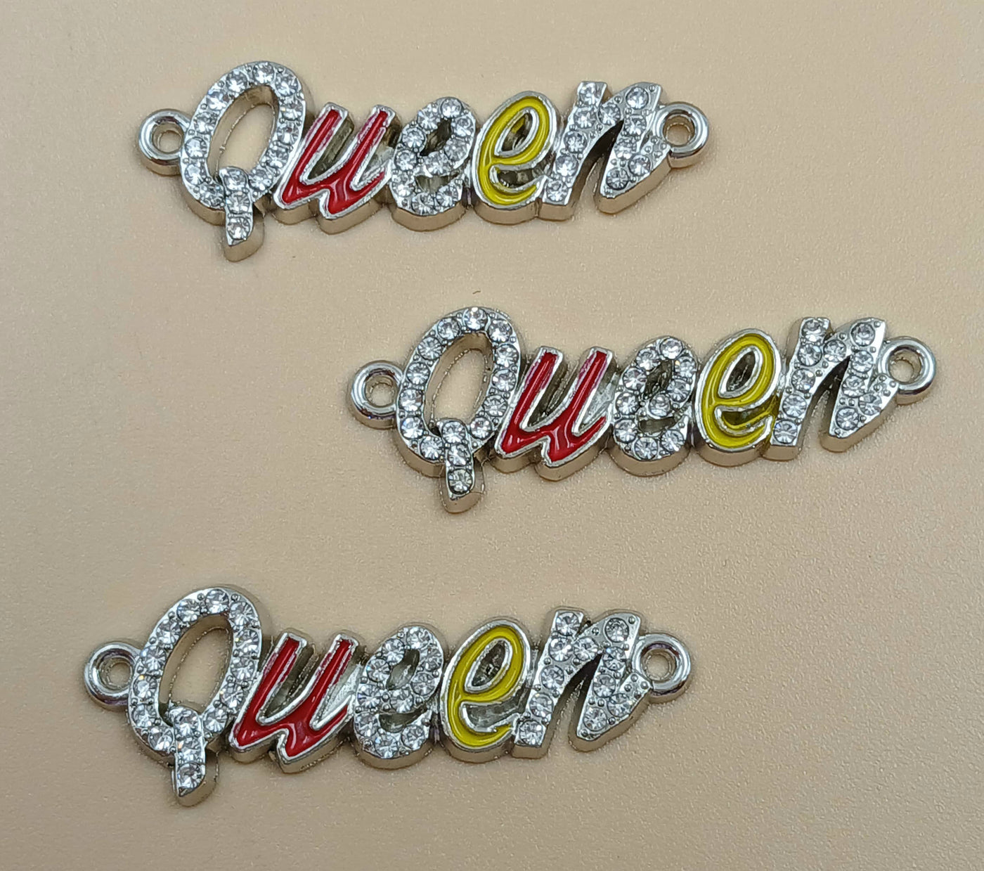Silver With White Stone Queen Badges