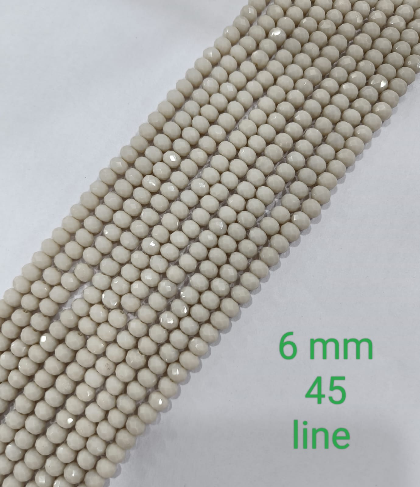 Off-White Tyre Crystal Beads (Wholesale