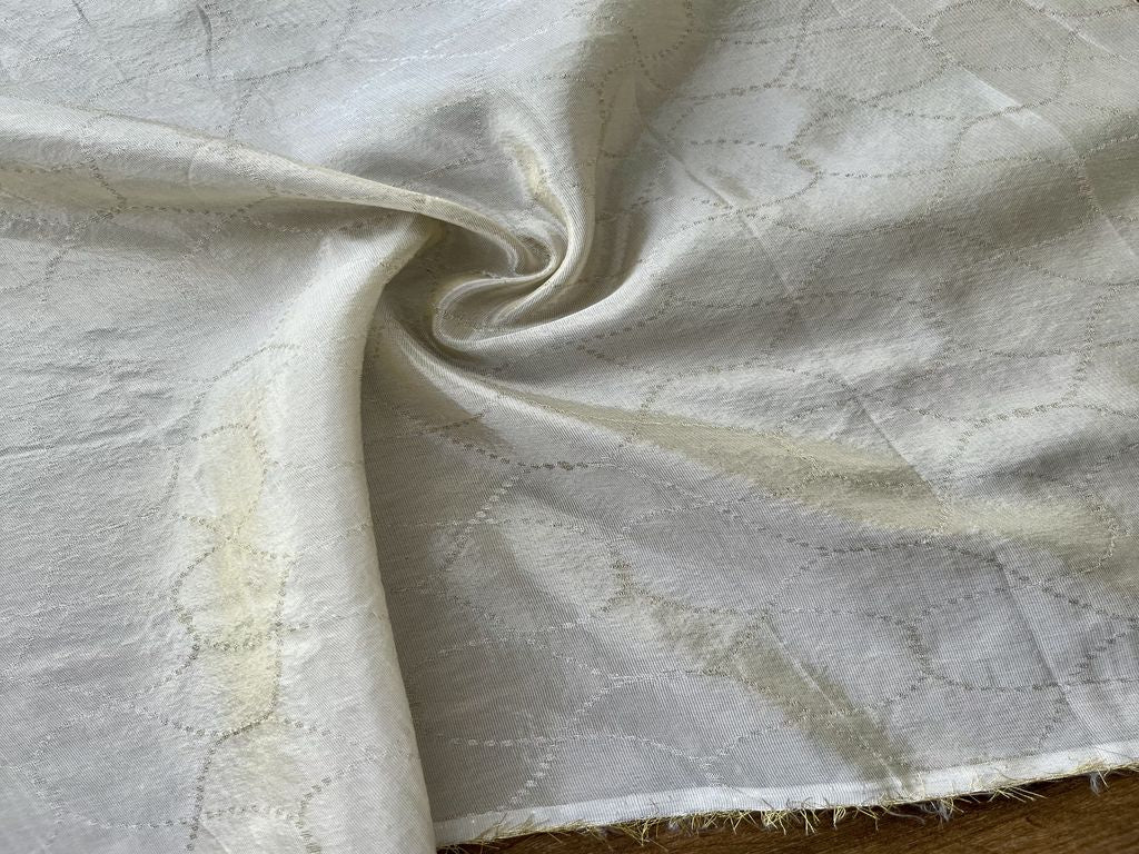 White with Golden Threads Interweaved Plain Dyeable Self Russian Silk Fabric