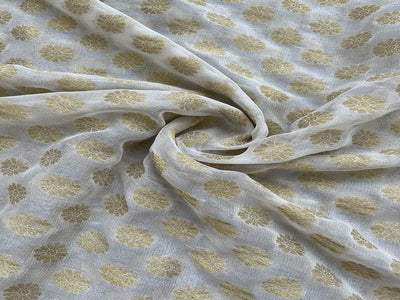 White Dyeable Golden Weaved Butti Georgette Fabric