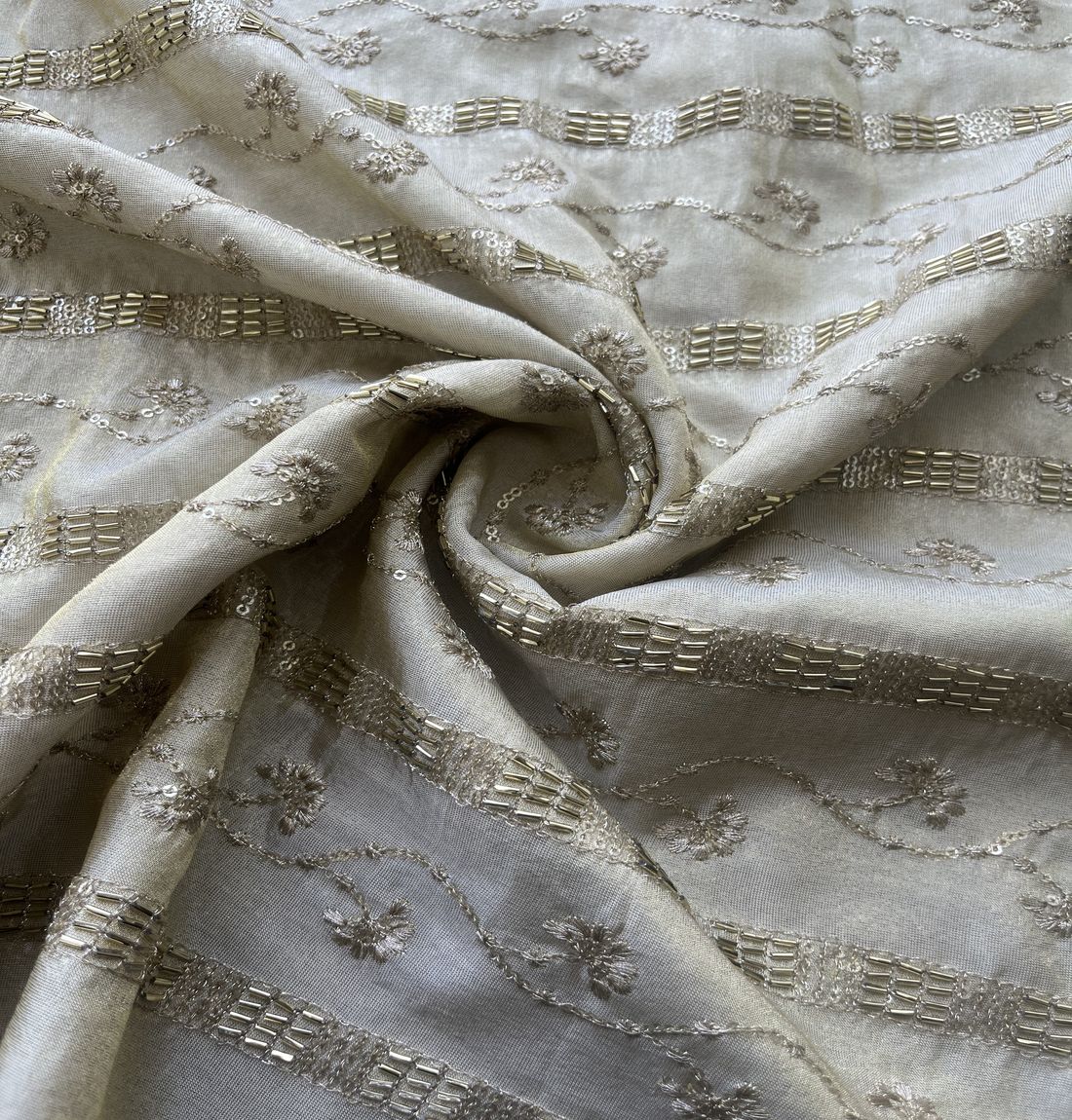 White & Golden Motifs Hand Embroidered Dyeable Sequins And Beads Motifs Tissue Silk Fabric